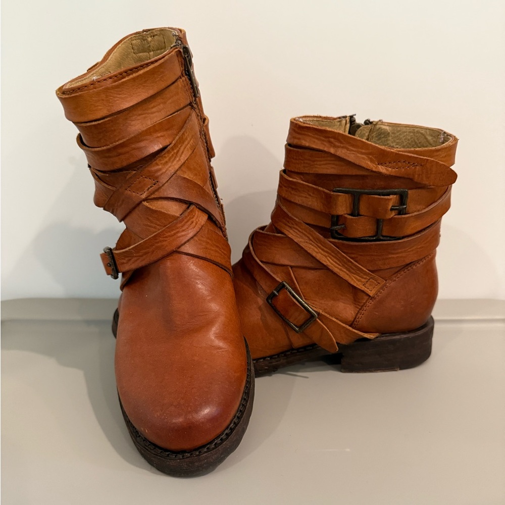 Frye boots with buckle and strap details. Size 7